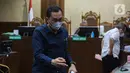 Heru Hanindyo, hakim nonaktif pada Pengadilan Negeri (PN) Surabaya, terdakwa kasus dugaan suap pengurusan perkara Gregorius Ronald Tannur, pelaku pembunuhan kekasihnya Dini Sera Afriyanti. (Liputan6.com/Angga Yuniar)