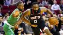 Pebasket Houston Rockets, James Harden, berusaha melewati pebasket Boston Celtics, Kemba Walker, pada laga NBA Rabu (12/2/2020). Houston Rockets menang 116-105 atas Boston Celtics. (AP/David J. Phillip)