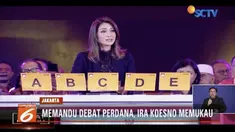 Ira Koesno selalu tampil memukau dengan ketegasannya saat memandu debat perdana capres dan cawapres.