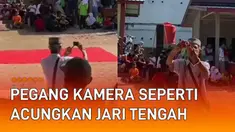 Aksi seorang kakek merekam video beda dari yang lain mengundang perhatian