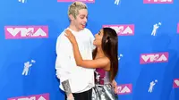 Tak perlu pernyataan cinta, seluruh dunia sepertinya sudah tahu kalau Ariana Grande dan Pete Davidson tengah dimabuk asmara. (Nicholas Hunt / GETTY IMAGES NORTH AMERICA / AFP)