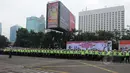 Ribuan personel polisi lalu lintas mengikuti apel Gelar Pasukan Ops Simpatik Jaya 2015 di Lapangan Ditlantas Polda Metro Jaya, Rabu (1/4/2015). (Liputan6.com/Herman Zakharia)