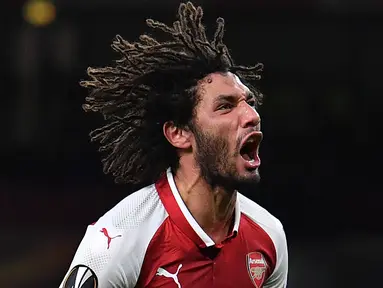 Pemain Arsenal, Mohamed Elneny menjadi salah satu pemain yang akan turun pada Piala Dunia 2018 bersama timnas Mesir. (AFP/Ben Stansall)