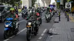 Petugas gabungan dari Satpol PP, Dishub, polisi hingga TNI melakukan patroli di kawasan Jalan Fatmawati, Jakarta, Kamis (15/4/2020). Patroli gabungan tersebut untuk mengimbau masyarakat agar tetap dirumah dan selalu menggunakan masker saat beraktivitas di luar rumah. (Liputan6.com/Faizal Fanani)