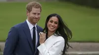 Pertunangannya dengan Pangeran Harry pun memberikan kebahagian para masyarakat multirasial. (DANIEL LEAL-OLIVAS / AFP)