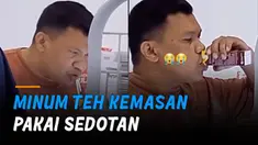 Momen kocak terjadi saat seorang bapak sedang minum minuman teh kemasan.