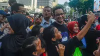 Kedatangannya mendapat sambutan meriah dari warga yang sedang berolahraga di Minggu (4/8/2024) pagi. (merdeka.com/Arie Basuki)