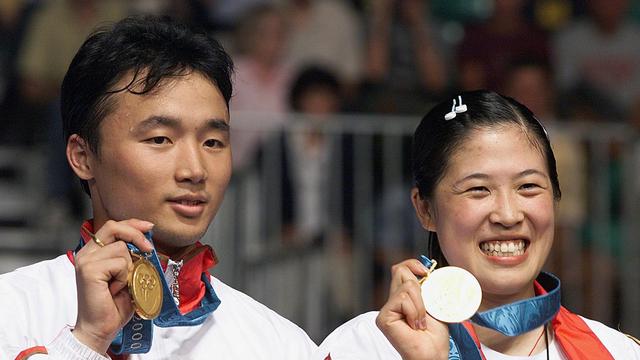 Gao Ling (kanan) and Zhang Jun, Olimpiade 2000. (AFP/Robyn Beck)