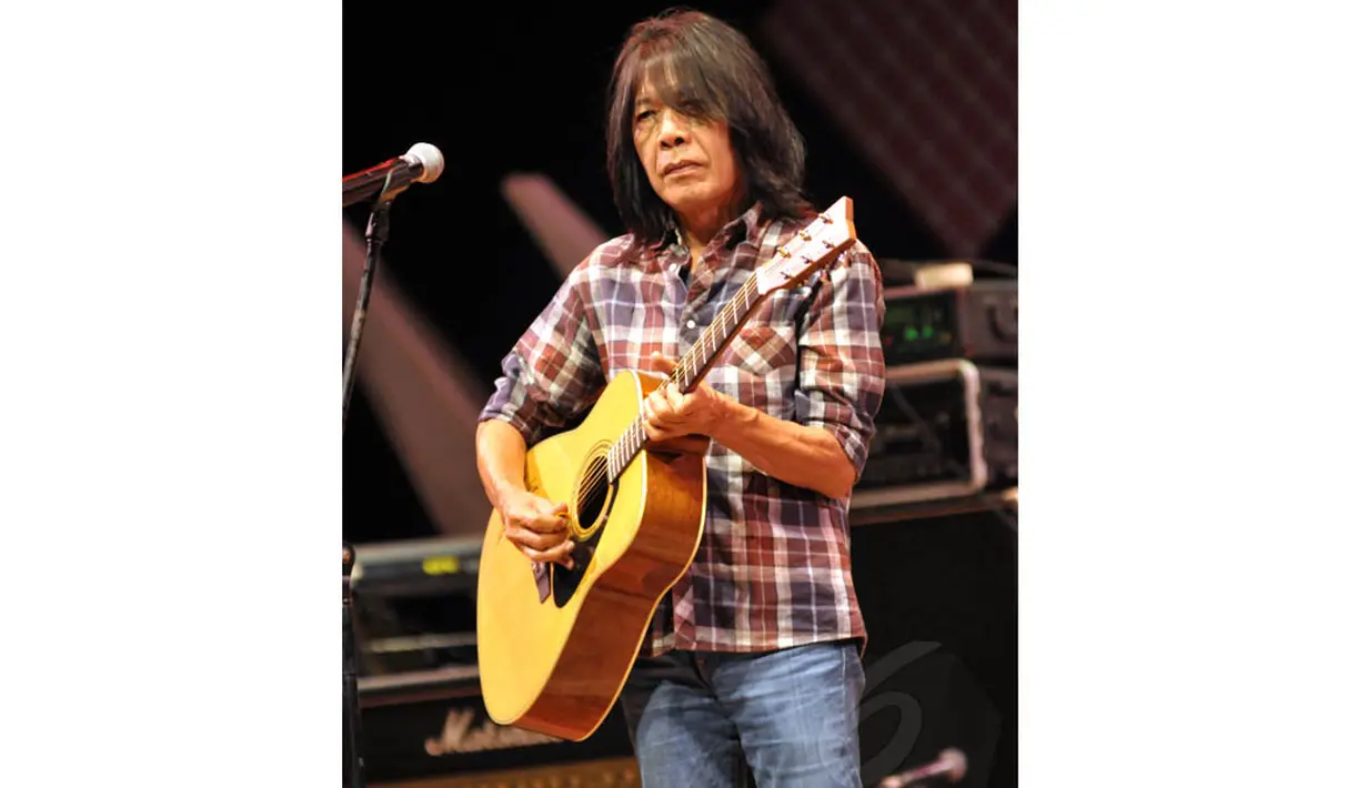 Pria pemilik nama asli Jusuf Antono Djojo itu berharap uang hasil pelelangan gitar dapat membantu pendanaan kampanye Jokowi dan JK, Jakarta, Senin (23/6/14). (Liputan6.com/Panji Diksana)