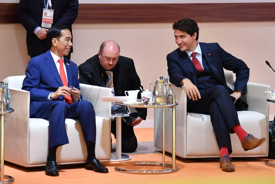 Presiden Jokowi duduk berdampingan dengan Perdana Menteri (PM) Kanada Justin Trudeau di KTT G20.