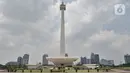 Suasana kawasan Monumen Nasional (Monas) yang ditutup, Jakarta, Minggu (15/3/2020). Gubernur Anies Baswedan menutup tempat wisata di DKI Jakarta seperti Monas, Ragunan, dan museum yang dikelola Pemprov DKI selama dua pekan ke depan guna mencegah penyebaran Covid-19. (merdeka.com/Iqbal S. Nugroho)