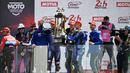 Tim Balap Yart Yamaha Official merayakan kemenangan di atas podium dalam ajang 24 Hours of Le Mans yang berlangsung di Sirkuit Bugatti, Prancis, 19 April 2026 waktu setempat. (AFP/Julien De Rosa)