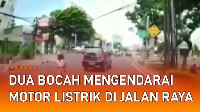 Aksi dua bocah kendarai motor listrik di jalan raya kembali terjadi.