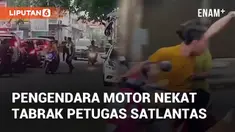 Pengendara motor nekat hampir menabrak petugas Satlantas saat menghindari razia Operasi Zebra. Insiden terjadi di Kecamatan Mojosari, Mojokerto, pada Rabu (23/10/2024)