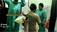 Sang ibu penuh antusias persiapkan baju wisuda, padahal sang anak masih pusing skripsian. (Sumber: TikTok/pejalanmodalyakin)
