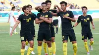 Pemain Timnas Malaysia U-23 merayakan gol Muhammad Safawi Rasid (11). (Bola.com/Twitter Ong Kim Swee)