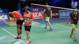 Ganda Campuran Indonesia, Tontowi Ahmad/Liliyana Natsir bersorak usai mengalahkan Ganda Campuran asal China Zheng Siwei/Chen Qingchen 22-20 21-15 dalam final BCA Indonesia Open 2017 di Jakarta, Minggu (18/6). (Liputan6.com/Faizal Fanani)