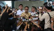 Menteri Perhubungan (Menhub) Budi Karya Sumadi (tengah) menjawab pertanyaan wartawan usai menjalani pemeriksaan di Gedung KPK C1, Jakarta, Rabu (26/7/2023). (Liputan6.com/Johan Tallo)