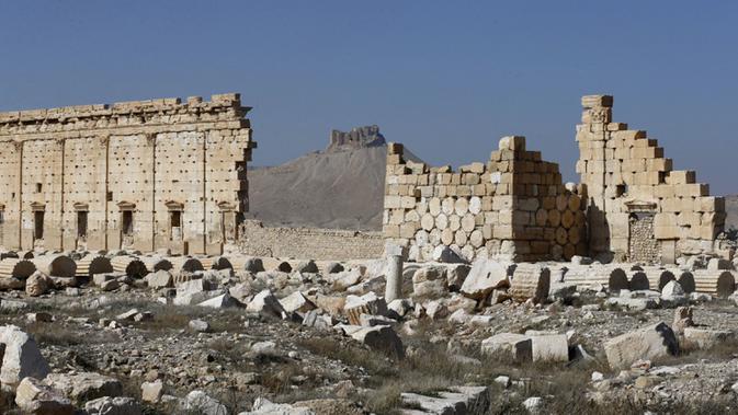 Sebagian pemandangan Kuil Bel yang rusak di kota kuno Palmyra, Provinsi Homs, Suriah, 7 Februari 2021. Suriah memiliki enam situs yang terdaftar dalam daftar elite warisan dunia UNESCO dan semuanya mengalami kerusakan dalam perang 10 tahun. (LOUAI BESHARA/AFP)