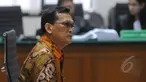 Mantan Wakil Kepala Korlantas Polri Brigjen Pol Didik Purnomo saat sidang lanjutan di Pengadilan Tipikor, Jakarta, Senin (30/3/2015). Sidang mengagendakan pembacaan nota pembelaan kasus korupsi pengadaan driving simulator. (Liputan6.com/Herman Zakharia)