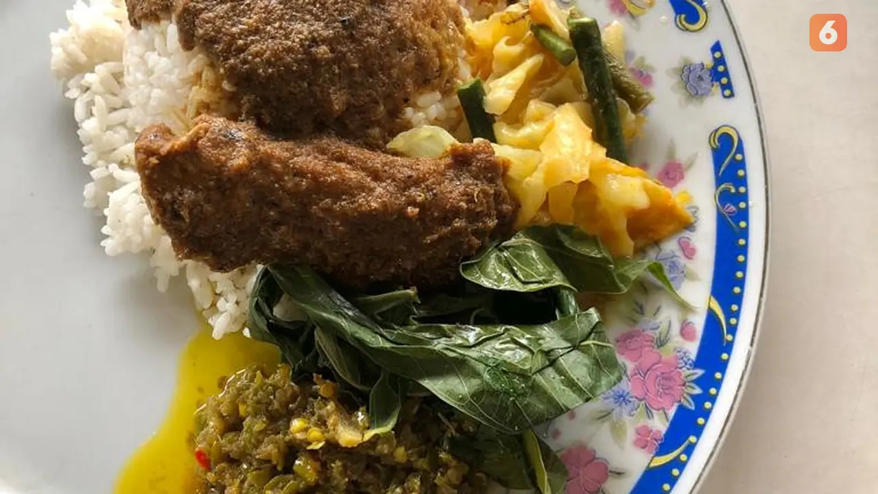 Ilustrasi rendang hidangan Idul Fitri yang kaya akan lemak dan kolesterol
