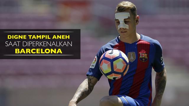 Lucas Digne tampil menggunakan masker saat diperkenalkan di hadapan publik Camp Nou. Alasannya karena ia baru saja menjalani operasi hidung
