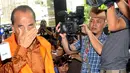 Gubernur Riau Annas Maamun tiba di Gedung KPK dibalut rompi oranye bertuliskan tahanan KPK, Jakarta, (8/10/14). (Liputan6.com/Miftahul Hayat) 