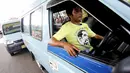 Menurut salah satu koordinator Pospera, Relawan Bis Kota dipersiapkan untuk mengajak masyarakat pengguna angkutan umum untuk memilih pasangan Jokowi-JK pada Pilpres 2014 mendatang, (29/5/2014). (Liputan6.com/Faizal Fanani)