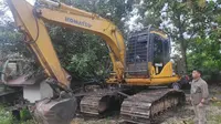 Alat berat yang disita oleh BBKSDA Riau dari perambahan Cagar Biosfer Giam Siak Kecil. (Liputan6.com/M Syukur)