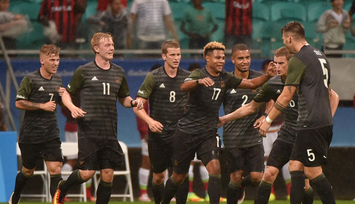 Jerman dan Meksiko bermain imbang 2-2 pada laga perdana Grup C Olimpiade Rio 2016 di Arena Fonte Nova, Jumat (5/8/2016) dini hari WIB. (AFP/Nelson Almeida)