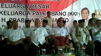 Prabowo Berbalut Songket Palembang