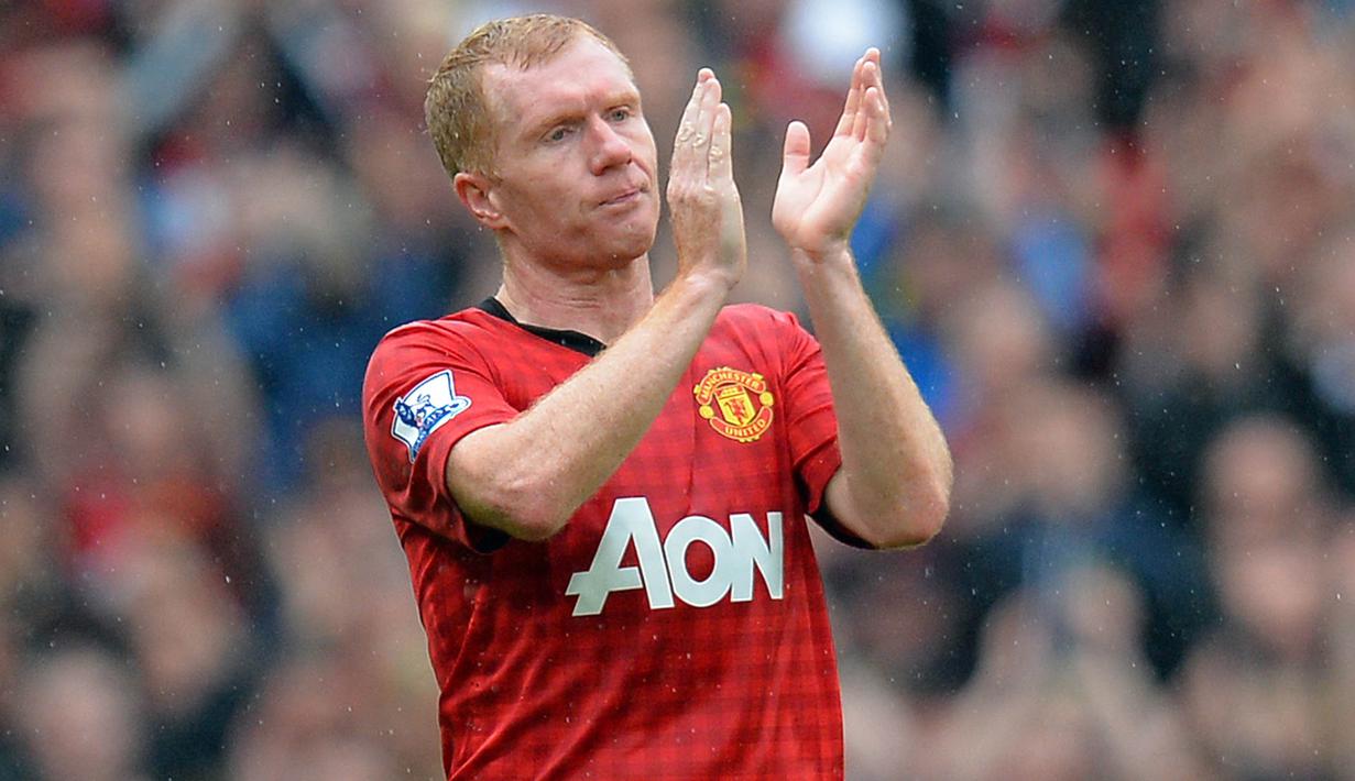 3. Paul Scholes - Lulusan dari akademi Manchester United yang dijuluki 'Class of 92' ini sempat pensiun pada Juli 2011. Hanya berselang enam bulan, gelandang kreatif ini diminta kembali memperkuat Setan Merah. (AFP/Andrew Yates)