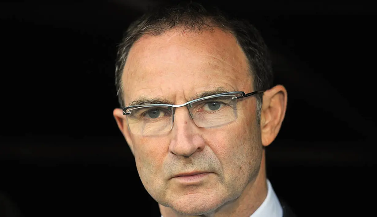 9. Martin O'Neill (Irlandia), dengan komposisi pemain terbatas mantan pelatih Leicester ini mampu membawa Republik Irlandia ke Euro 2016. Dalam sebulan dirinya mendapat gaji sebesar 83.333 euro atau 1,23 miliar rupiah. (AFP/Glyn Kirk) 