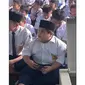 Potret bocah viral mirip karakter Russell di film Up. (Sumber: TikTok/firyalll86)