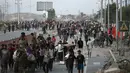 Penandatangan pernyataan juga mengungkap bahwa stok bantuan yang sangat dibutuhkan kini tertahan, baik di luar perbatasan maupun di dalam Gaza sendiri, karena terbatasnya akses distribusi. (Eyad BABA/AFP)
