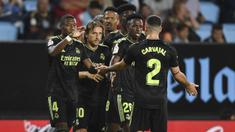 Meski baru saja ditinggal gelandang andalannya Casemiro yang hijrah ke Manchester United, Real Madrid masih tampil perkasa dalam lanjutan pekan kedua Liga Spanyol 2022/2023. Bertandang ke markas Celta Vigo, Luka Modric dan kawan-kawan mampu menang telak 4-1 dan sementara memimpin di puncak klasemen dengan poin 6 dari sapu bersiih dua kemenangan. (AFP/Miguel Riopa)