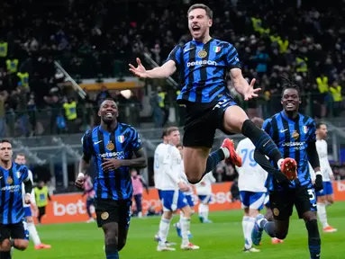 Inter Milan berhasil mengalahkan Como 1907 pada lanjutan Liga Italia di Stadion Giuseppe Meazza berkat penampilan dua pemain mereka yang gemilang, yakni Carlos Augusto dan Marcus Thuram. (AP Photo/Luca Bruno)