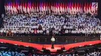 Presiden RI terpilih 2019-2014, Joko Widodo saat menyampaikan pidato Visi Indonesia di SICC, Sentul, Kab Bogor, Jawa Barat, Minggu (14/7/2019). Acara ini dihadiri sejumlah menteri kabinet kerja serta Wakil Presiden terpilih 2019-2024, KH Ma’ruf Amin. (Liputan6.com/Helmi Fithriansyah)