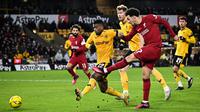 Liverpool meraih kemenangan 1-0 atas Wolverhampton Wanderers pada laga replay putaran ketiga Piala FA di Molineux Stadium, Rabu (18/1/2023) dini hari WIB. (AFP/Oli Scarff)