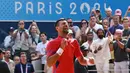 Novak Djokovic telah menamatkan tenis. Medali emas Olimpiade 2024 jadi kepingan terakhir yang membawa Djokovic melengkapi Golden Slam. (AFP/Carl De Souza)