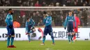 Pemain Arsenal, Henrikh Mkhitaryan (tengah) tertunduk lesu setelah Swansea City mencetak gol ketiga dalam laga pekan ke-25 Premier League 2017-2018 di Liberty Stadium, Selasa (30/1). Arsenal dipaksa menyerah Swansea City 1-3. (Nick Potts/PA via AP)