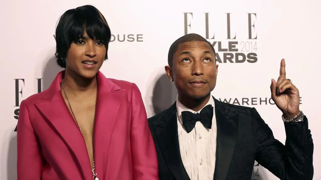 Intip Kemesraan Pharrell Williams dan Sang Istri di Depan Publik