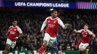 Bek Arsenal, Gabriel Magalhaes merayakan gol ke gawang Atletico Madrid di Liga Champions 2025-2026. (AP Photo/Alastair Grant)