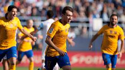 Ekspresi Munir El Haddadi setelah mencetak gol pertama Barcelona di menit ke-2 ke gawang Malaga dalam laga La Liga Spanyol di Stadion La Rosaleda, Malaga, Sabtu (23/1/2016). Barcelona menang 2-1. (AFP/Jorge Guerrero)