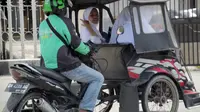 Sejumlah siswa menggunakan jasa gojek bentor saat pergi ke sekolah Kota Gorontalo (Foto: Arfandi Ibrahim/Liputan6.com)