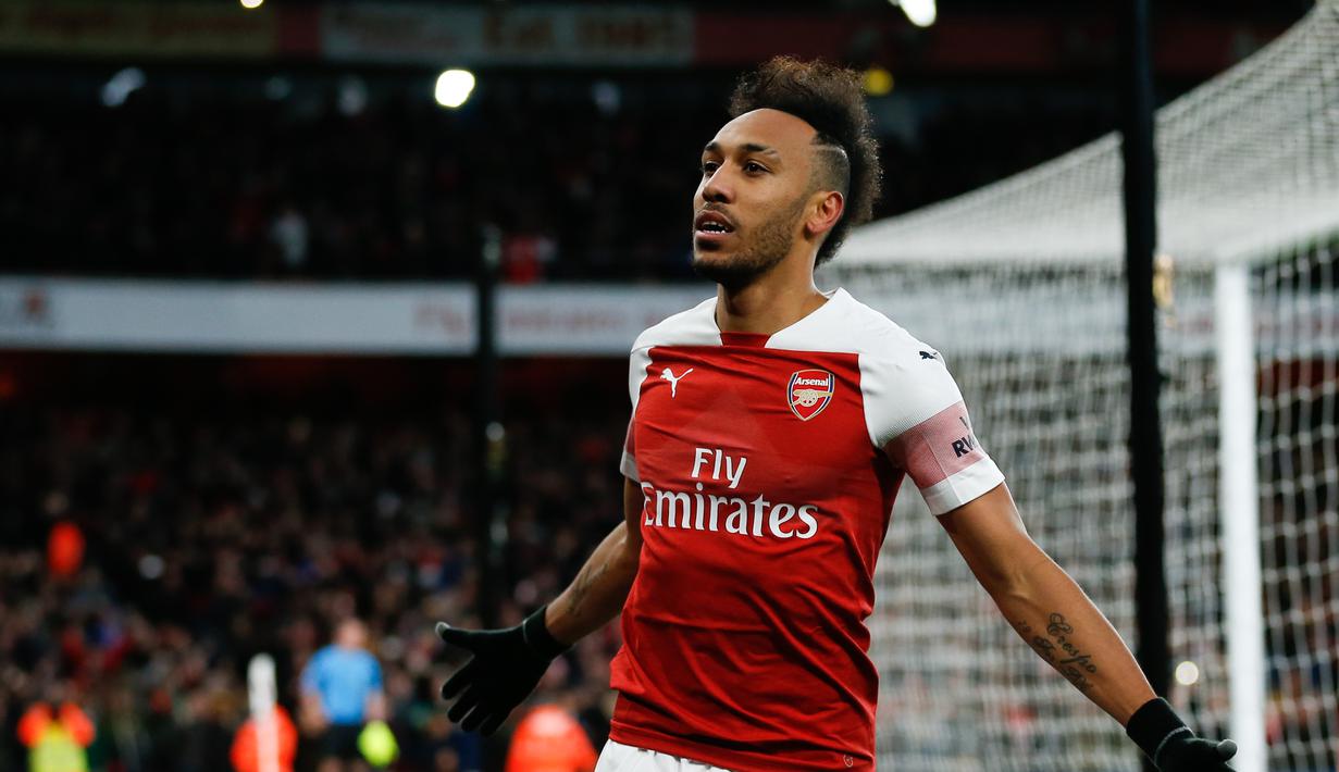 Perayaan gol Aubameyang pada laga lanjutan Premier League yang berlangsung di Stadion Emirates, London, Minggu (10/3). Arsenal menang 2-0 atas Man United. (AFP/Ian Kington)