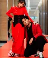 Thariq Halilintar dan Fuji tampil sebagai pasangan swag dan edgy memakai dress dan jas dengan kombinasi warna merah-hitam (Foto: Instagram @thariqhalilintar)