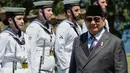 Kedua negara juga merayakan 75 tahun hubungan diplomatik pada tahun lalu sebagai momentum untuk memperkuat kemitraan strategis yang saling menguntungkan di masa depan.Presiden Indonesia Prabowo Subianto (kanan) memeriksa pasukan kehormatan di Admiralty House di Sydney, Australia, pada Rabu 12 November 2025. (Rick Rycroft/POOL/AFP)