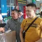 5 WNI asal Sulut dipulangkan di Indonesia setelah sempat ditahan di Filipina melalui Bandara Sam Ratulangi, Manado. (Foto: Liputan6.com/Yoseph Ikanubun)