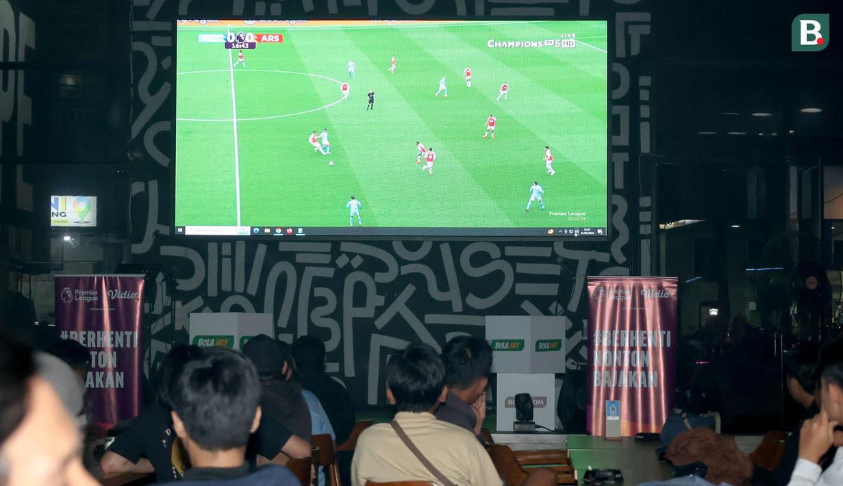 Tangkapan layar Roaring Night pertandingan Liga Inggris 2023/2024 antara Manchester City melawan Arsenal di Hype Cafe, Depok, Minggu (31/3/2024) malam. (Bola.com/Abdul Aziz)